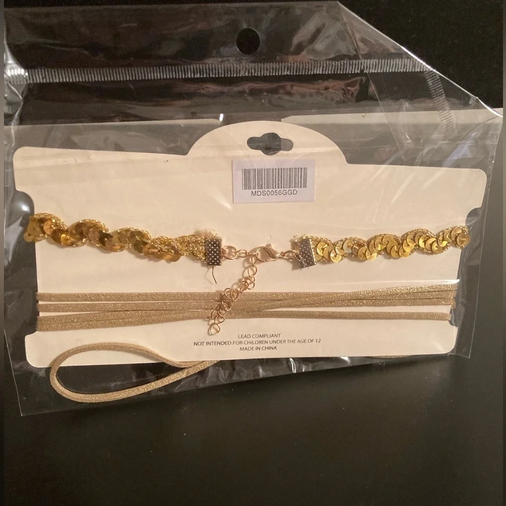 MIA set of 2 chokers. Golden sequins and golden bow